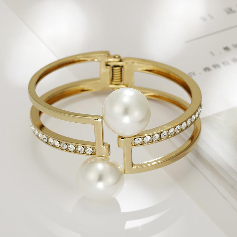 Vienna Verve Gold Pearl Asymmetric Bracelet for Women, Handcrafted Circular Jewelry from Direct Manufacturer