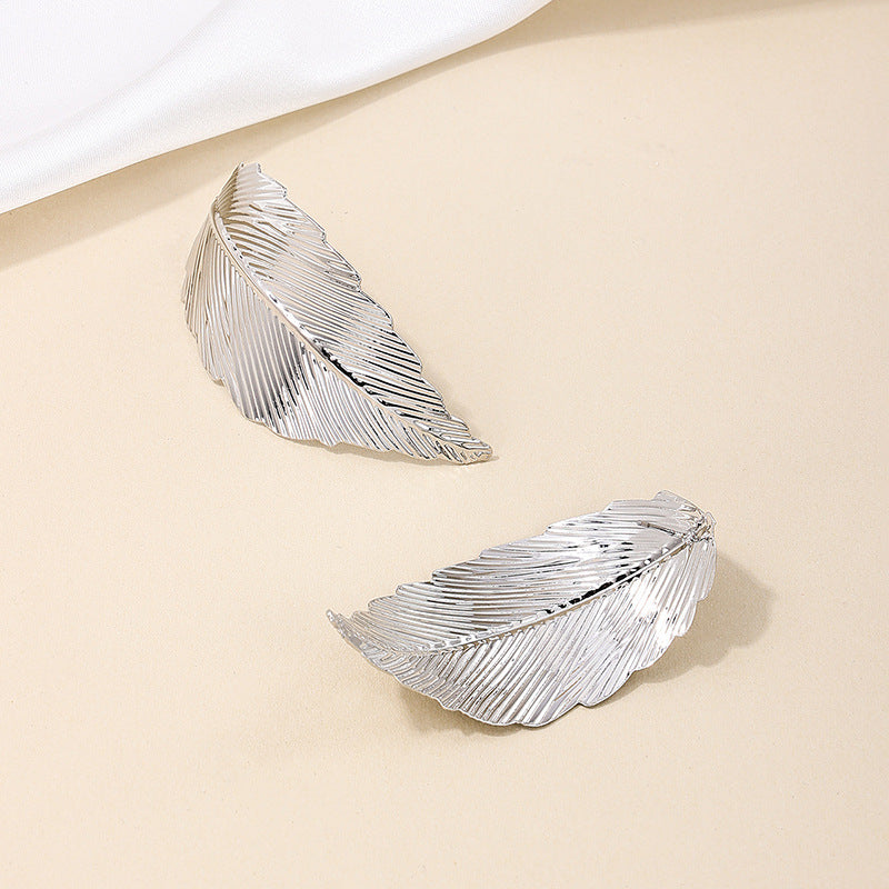 Feathered Metal Leaf Earrings with a Vintage Vibe