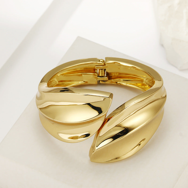 Glossy Gold Leaf Bracelet with Asymmetric Design