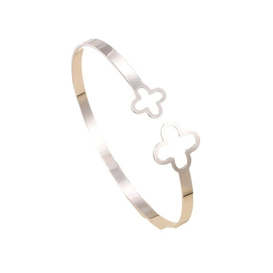 Four-Leaf Clover Hollow Bracelet with Creative Floral Design