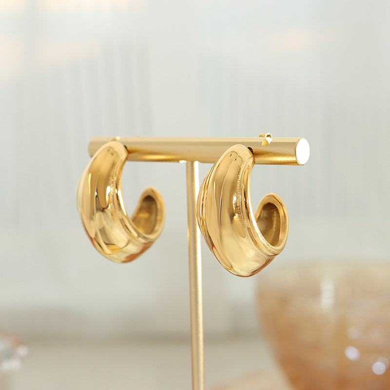 C-Shaped Textured Earrings in Gold Plated Titanium Steel