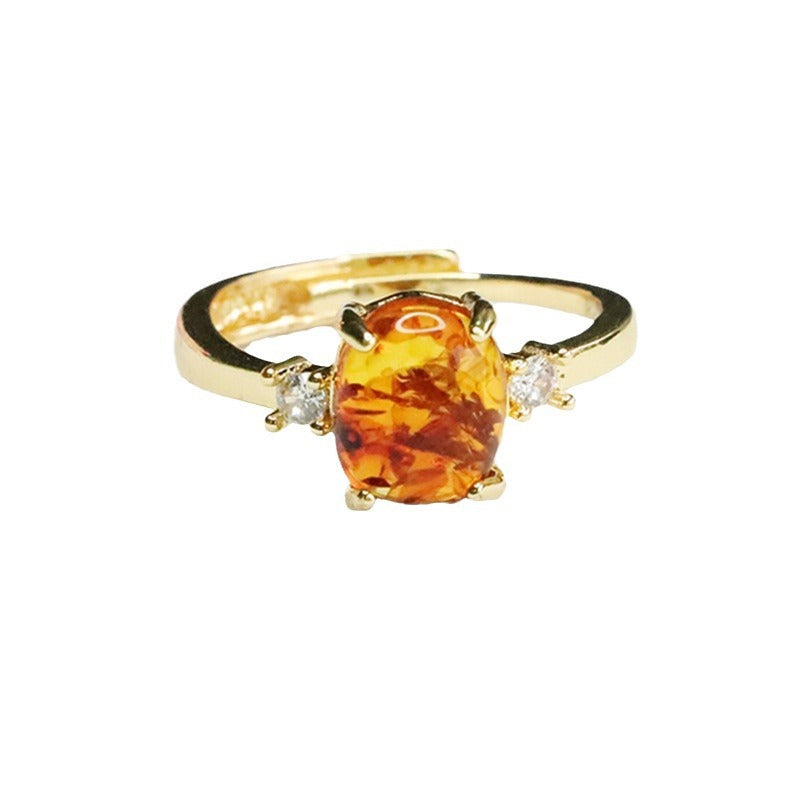 Elegant Sterling Silver Ring with Beeswax Amber Floral Detail