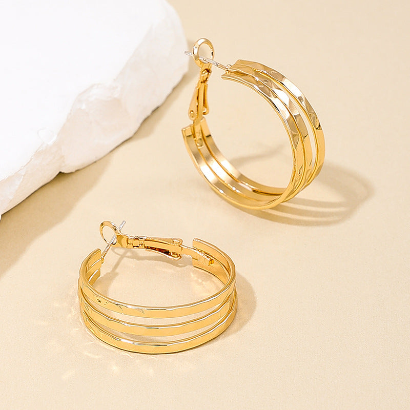 Retro Chic Metal Earrings with Unique Circle Design - Vienna Verve Collection