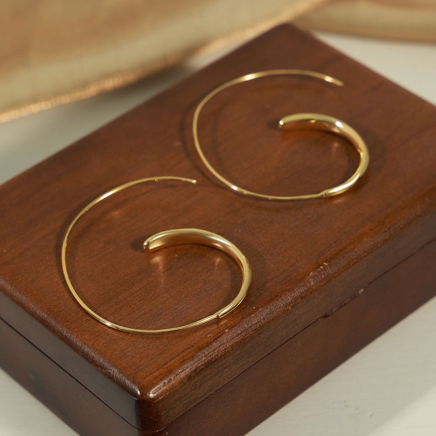 Curved Copper Earrings with Unique Design and Modern Style