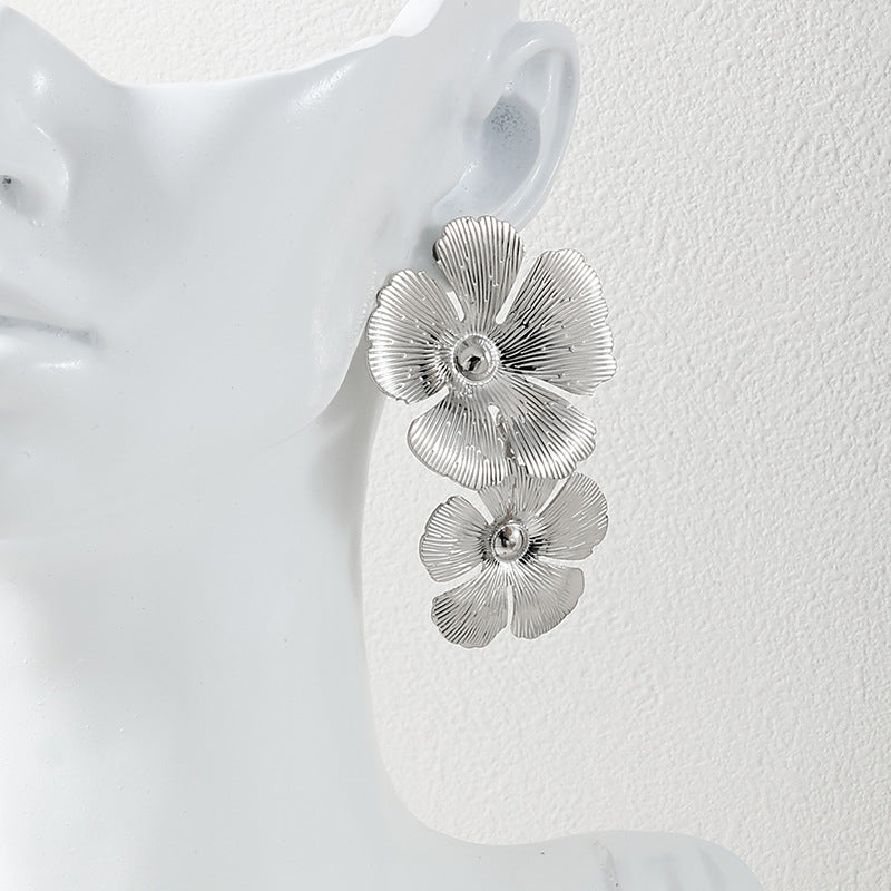 Exaggerated Metal Flower Earrings with Retro Flair