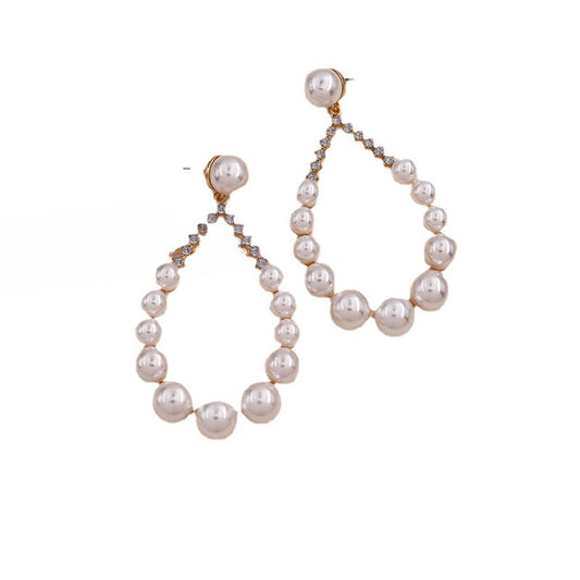 Extravagant Pearl Alloy Earrings with Celebrity Inspiration