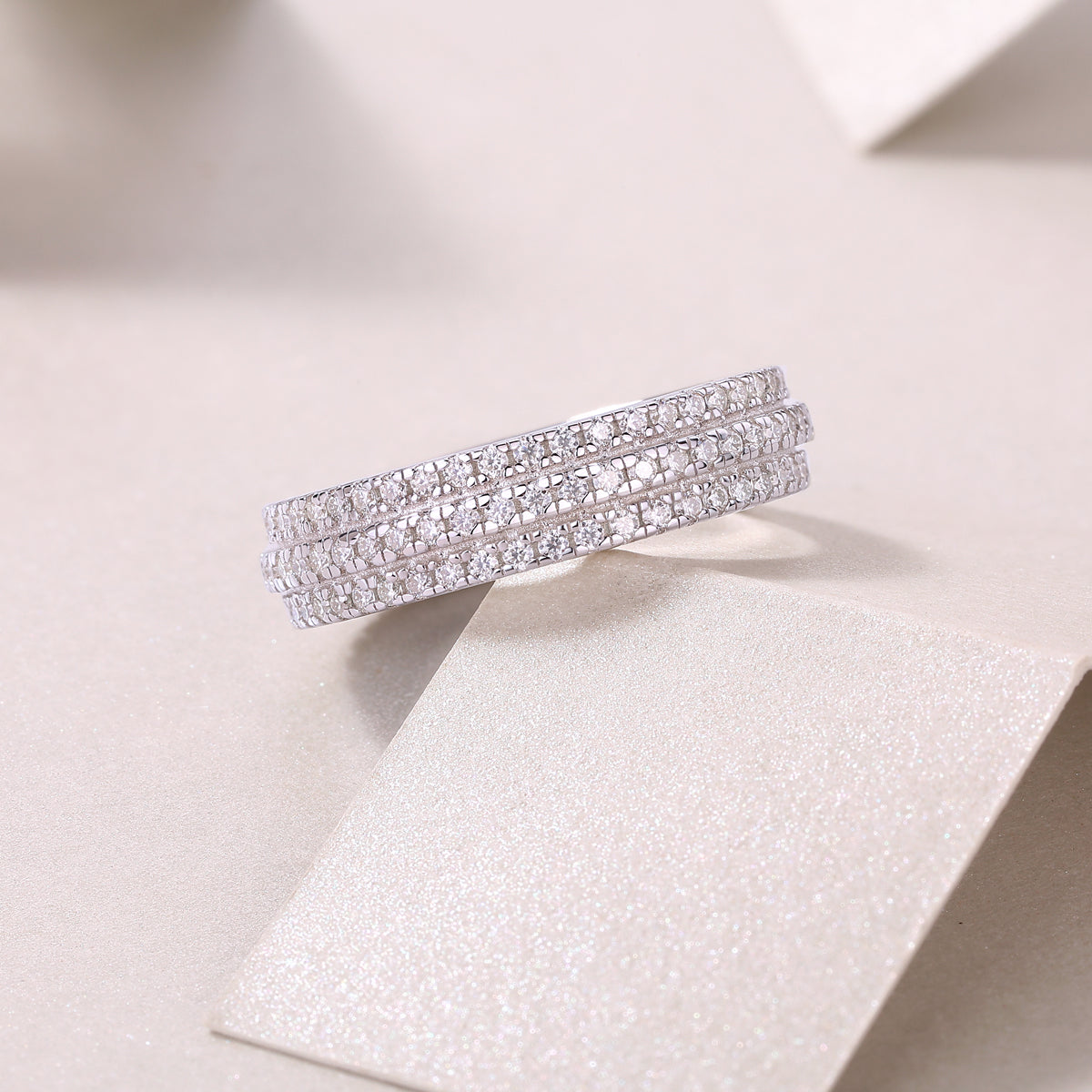 0.84 Carat Moissanite Eternity Ring with Three Rows of Round Stones in S925 Silver and Platinum Finish