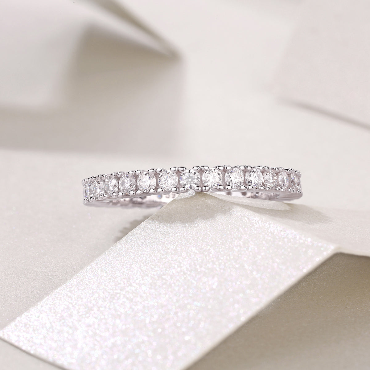 0.9 Carat Round Moissanite Eternity Ring in S925 Silver with Platinum Plating