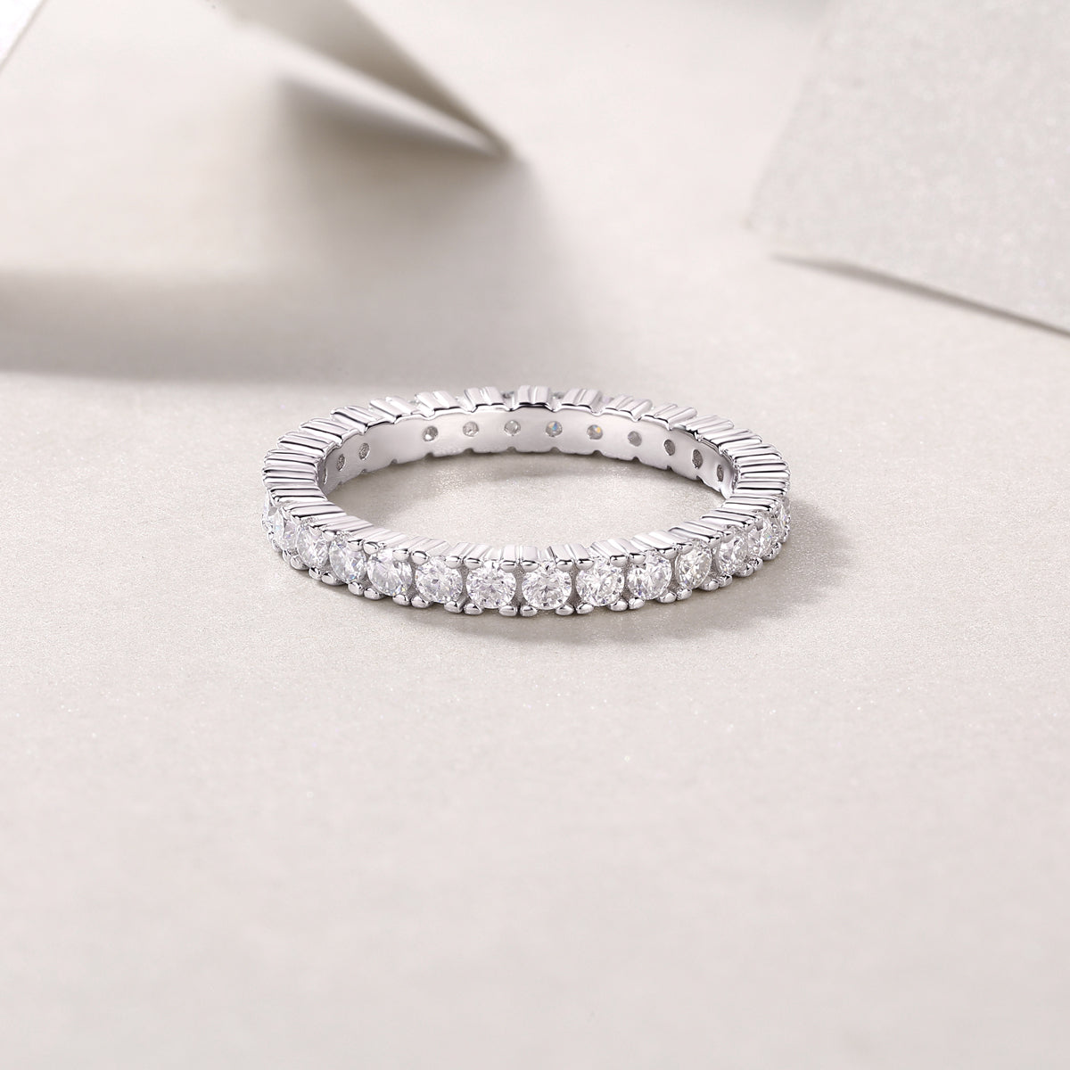 0.9 Carat Round Moissanite Eternity Ring in S925 Silver with Platinum Plating