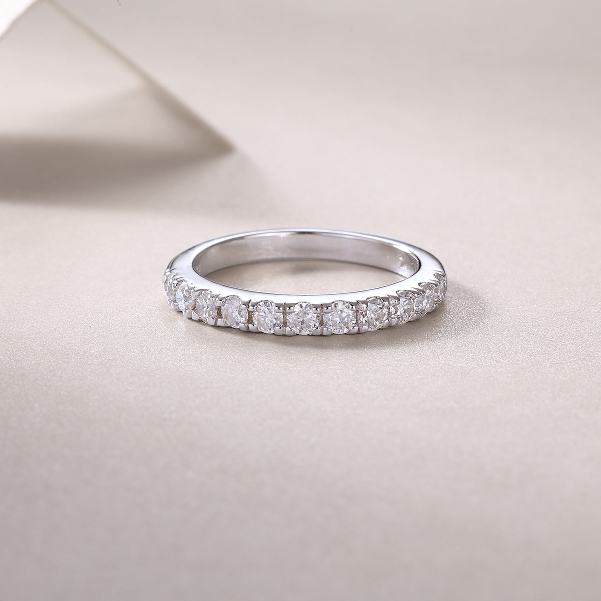 0.48 Carat Half Eternity Ring with Round Moissanite in S925 Silver Plated Platinum