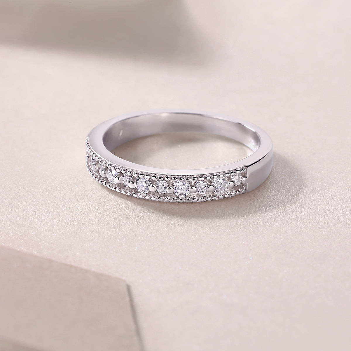 0.27 Carat Dual-Sized Round Moissanite Half Eternity Ring in S925 Silver Plated Platinum