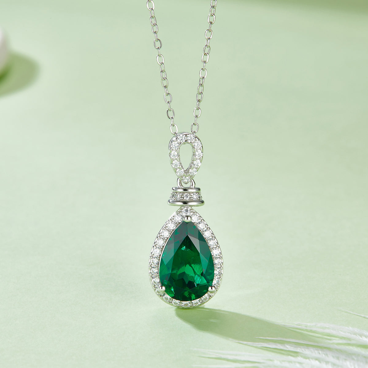 Gala Fireworks 4.0 Carat Pear Shaped Lab Created Emerald Halo Necklace in S925 Silver Plated Platinum