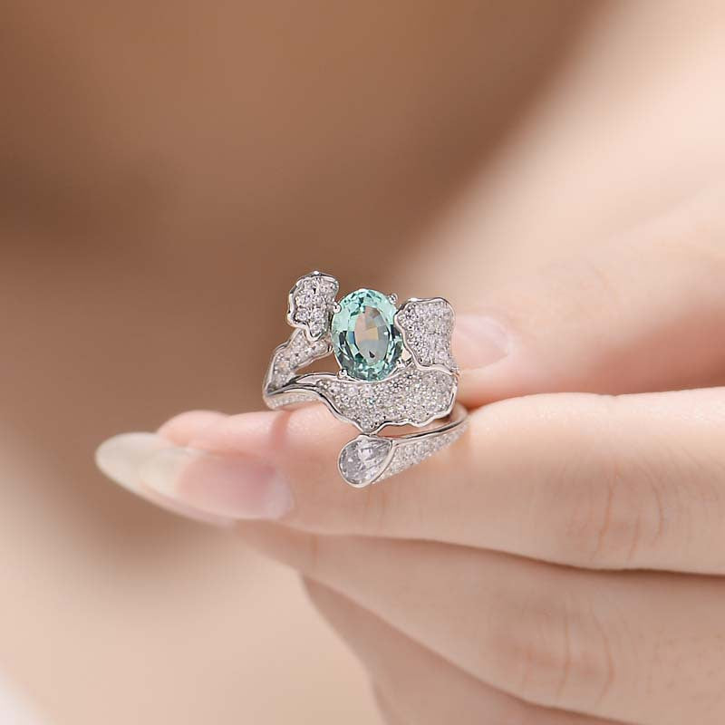 Cyan Zircon 7*9mm Oval Ice Cut Waves Luxurious Silver Ring for Women