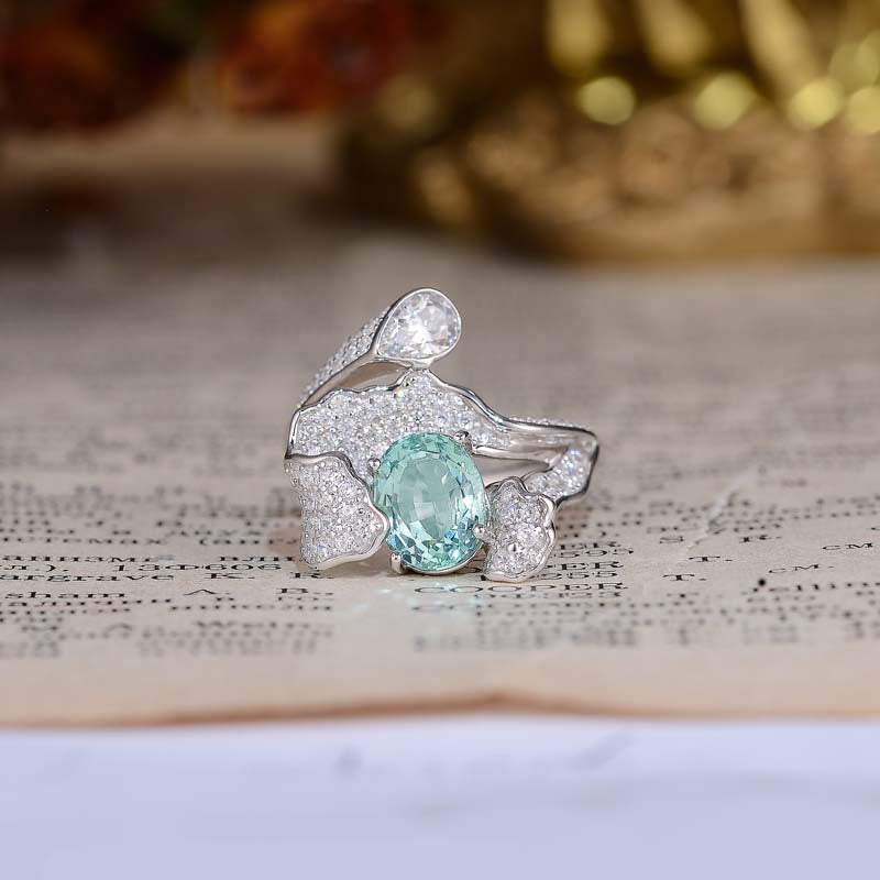 Cyan Zircon 7*9mm Oval Ice Cut Waves Luxurious Silver Ring for Women